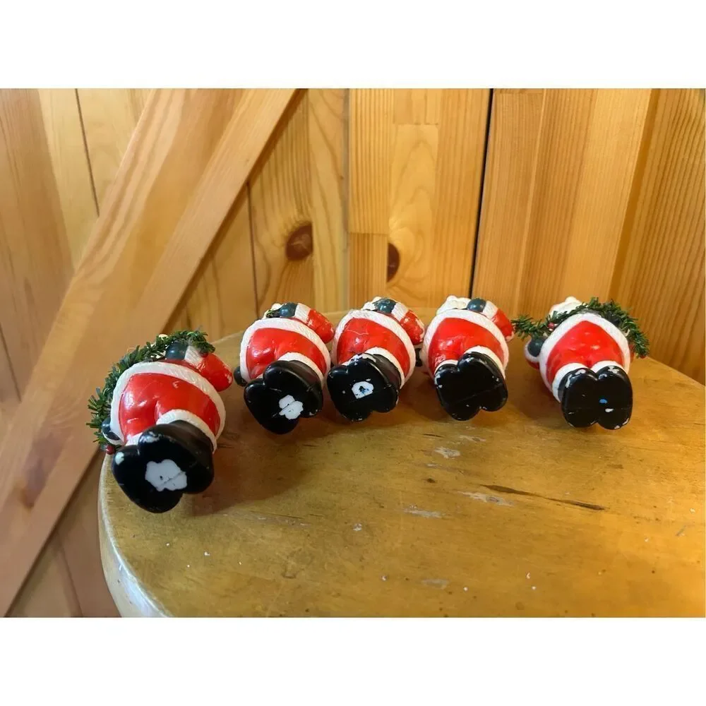 Vintage plastic Santa’s candle holders set of five (8817)￼